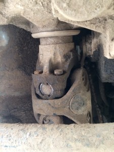Double Cardan U Joint. The top of the picture is the output from the transfer case